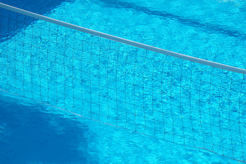 Volleyball net in the swimming pool.