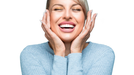 Laughing woman with great teeth over white background.