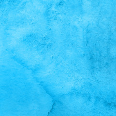 Obraz premium Blue watercolor winter texture with abstract washes and brush strokes on the white paper background.