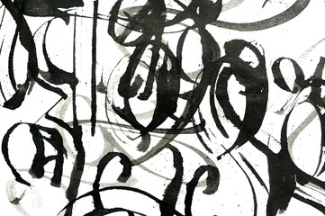 Black abstract brush strokes and splashes of paint on paper. Grunge art calligraphy background