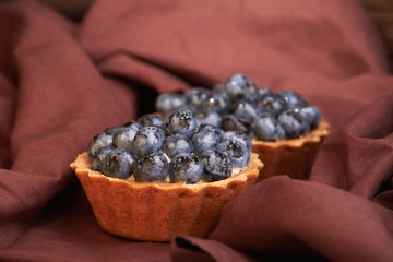 homemade sweet cakes with blueberry berries. delicious home baking