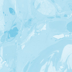 Blue marble ink texture with abstract washes and brush strokes on the white paper background.