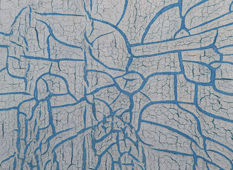 Obraz premium Cracked paint on wooden background, texture. Vintage wallpaper