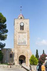 Clock tower and bell tower over the entrance to the Greek Orthodox Monastery of the Transfiguration...
