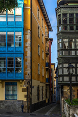 Street with typical buildings in Portugalete historic center near Bilbao, Basque Country, Spain