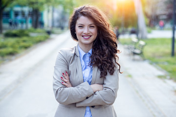 Portrait of business woman with arms crossed outdoor