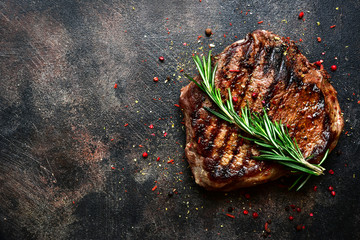 Fototapeta Roasted beef steak. Top view with copy space. obraz