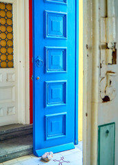 A typical Arab blue wooden door in a Medina.