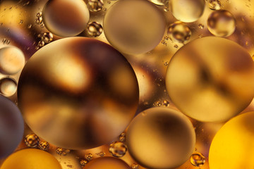 oil bubbles golden colour macro background