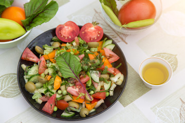 Fresh mixed vegetables salad close up