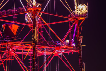 Antenna tower at night in the city