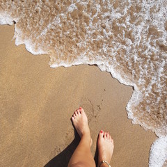 feet on the beach