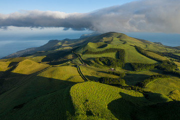 Aerial image showing the volcanic mountains of the San Jorge Island in the Azores, near pico de la...