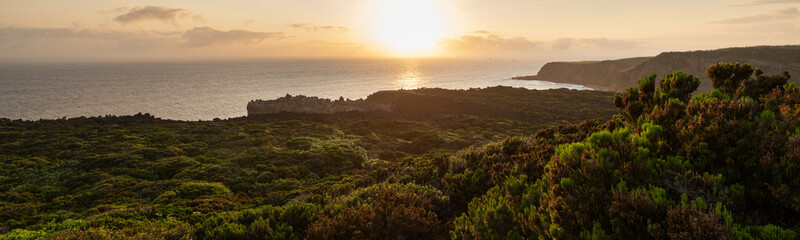 Amazing green landscape at sunrise at the mirador de Alagoa of the Agualva coastline on Terceira, Azores