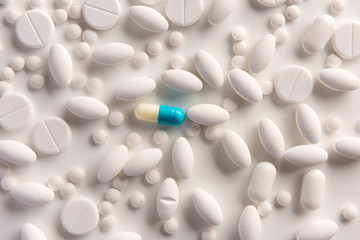 Different pills on white background. Flat lay.