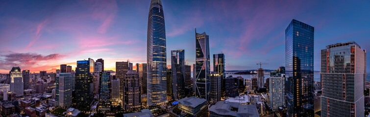 Twilight with a pink and blue sunset over San Francisco skyline with Salesforce Tower in the middle...