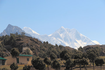 View from the valley near Namche Bazaar town to the snowy peaks of the Everest and Lhotse...