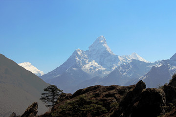View of snow capped Ama Dablam mountain from afar in Sagarmatha national park in Nepal. Nature,...