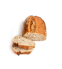 Loaf of whole wheat bread with slices isolated on white background