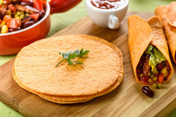 Tacos - delicious tortillas with meat and vegetables