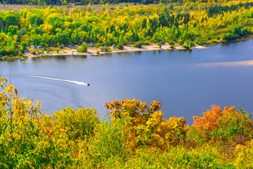 jet ski moves along the river or lake on a clear Sunny day in early autumn  © sorokinsamara