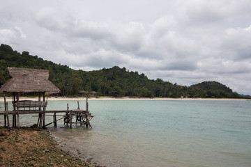 Fototapeta na wymiar a rusty wooden boat dock in Koh Talu Island near Hua HIn Thailand