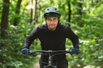 Concentrated bicyclist heading directly to finish line