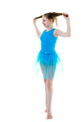 The little girl is pulling herself in pigtails.