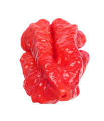 Fresh red chili pepper (Capsicum chinense) close-up isolated on white background