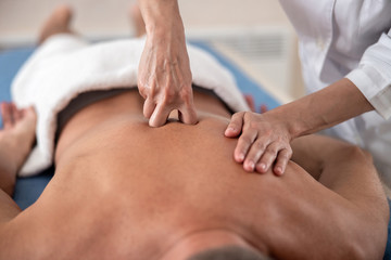 Fototapeta na wymiar Close up of male back during massage