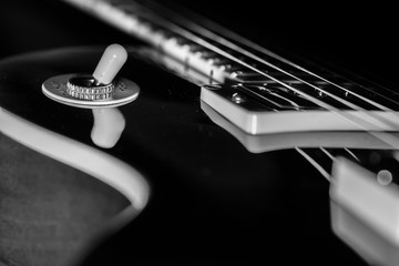 electric guitar, black & white, close-up