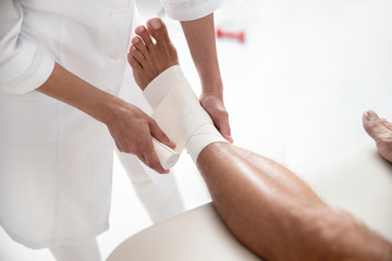 Close up of male leg with a bandage