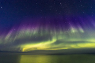 Northern Boreal Lights at sea in Lady Richardson Bay, Victoria Island,  northwest passage in Canada.