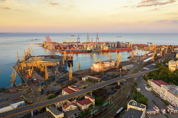 Cargo crane, ship and grain dryer in port Odessa,