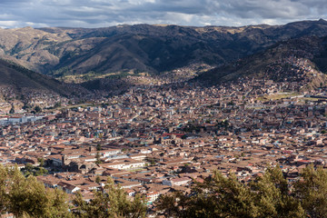 Fototapeta na wymiar Panoramic City view of Cusco from Sacsayhuaman ruins in the hills, Peru, South America.