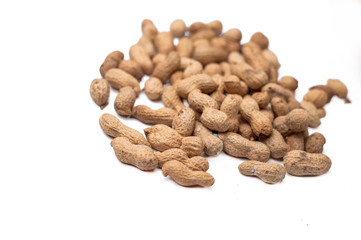 Useful peanut, close-up, isolated on white background. Protein source. Healthy food