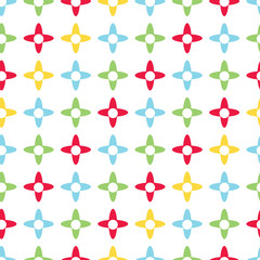 Bright colored x shapes vector seamless pattern. Primary colors of red, green, blue and yellow. Great for kids and babies.