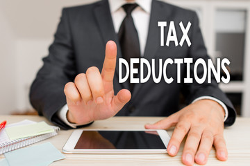 Text sign showing Tax Deductions. Business photo showcasing an amount or cost that subtracted from someone s is income