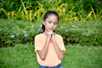 A Beautiful Minority Female Praying