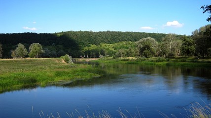 landscape with lake and blue sky