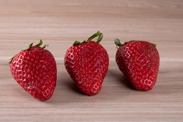  set fresh strawberries on wooden background