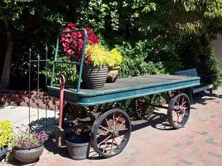 Rustic Green Railroad Luggage Cart with Flowers