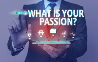 Writing note showing What Is Your Passion Question. Business concept for asking about his strong and barely controllable emotion Male wear formal suit presenting presentation smart device