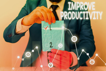Conceptual hand writing showing Improve Productivity. Concept meaning to increase the machine and...