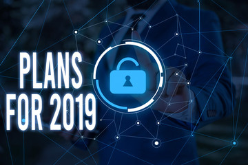 Writing note showing Plans For 2019. Business concept for an intention or decision about what one is going to do Male wear formal work suit presenting presentation smart device