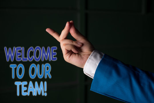 Text sign showing Welcome To Our Team. Business photo text introducing another demonstrating to your team mates Isolated hand pointing with finger. Business concept pointing finger