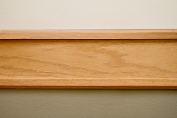 Horizontal stripe of wood as a background for brochure or scrapbook page; green and bown boarder for a backdrop