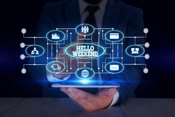 Text sign showing Hello Weekend. Business photo text Getaway Adventure Friday Positivity Relaxation Invitation Male human wear formal work suit presenting presentation using smart device