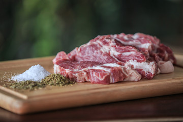 Close up raw pork on cutting board