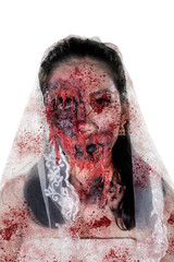 Scary bride ghost with bloody face on studio